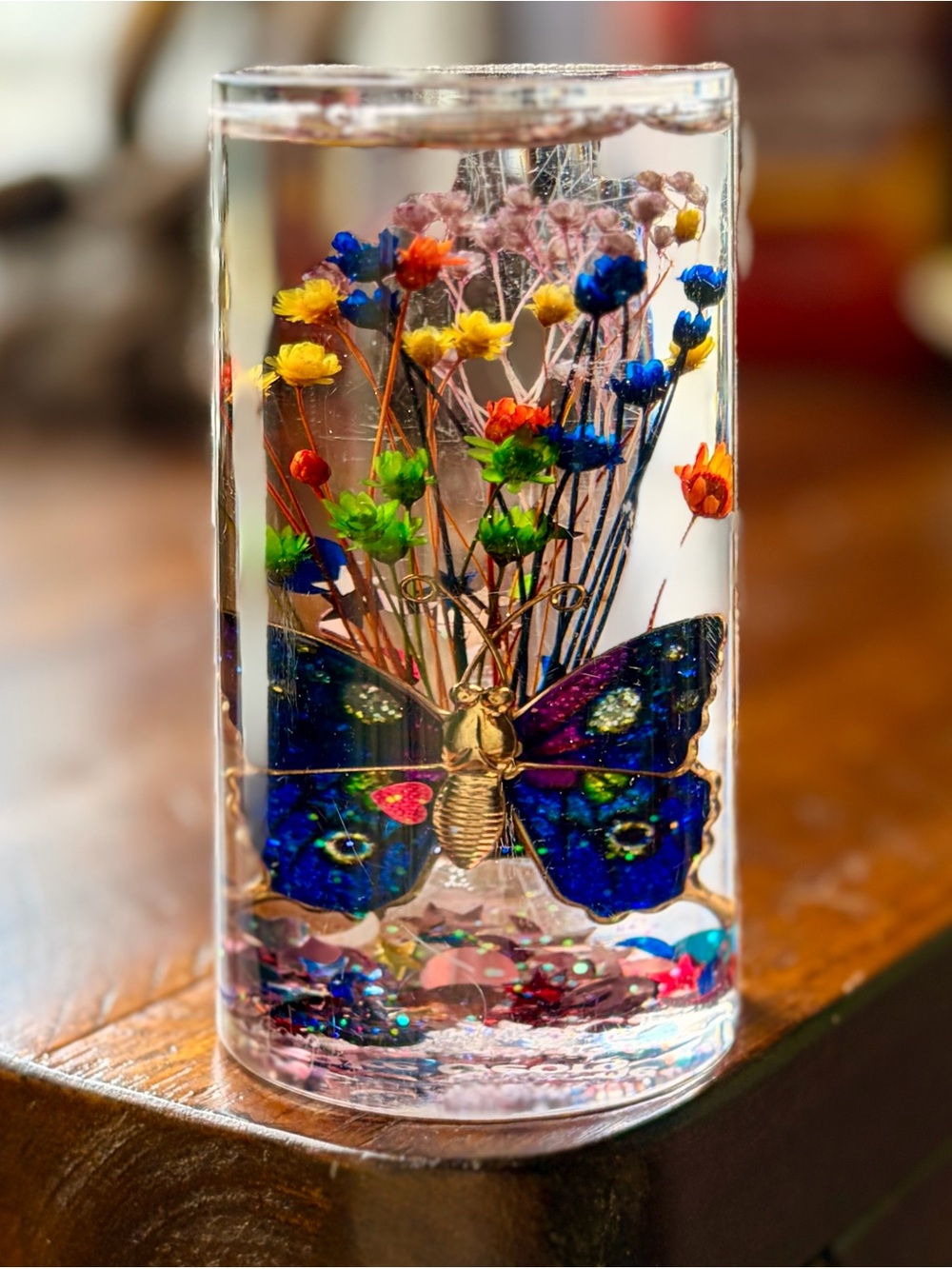 Charming Encased Faux Blue Butterfly & Florals Resin Art Cylinder With Water